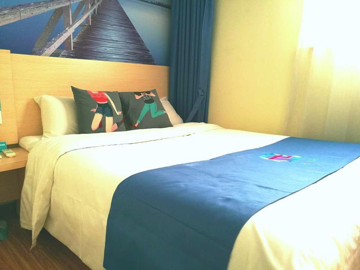 Pai Hotel Heze Dingtao Wantai City Esterno foto