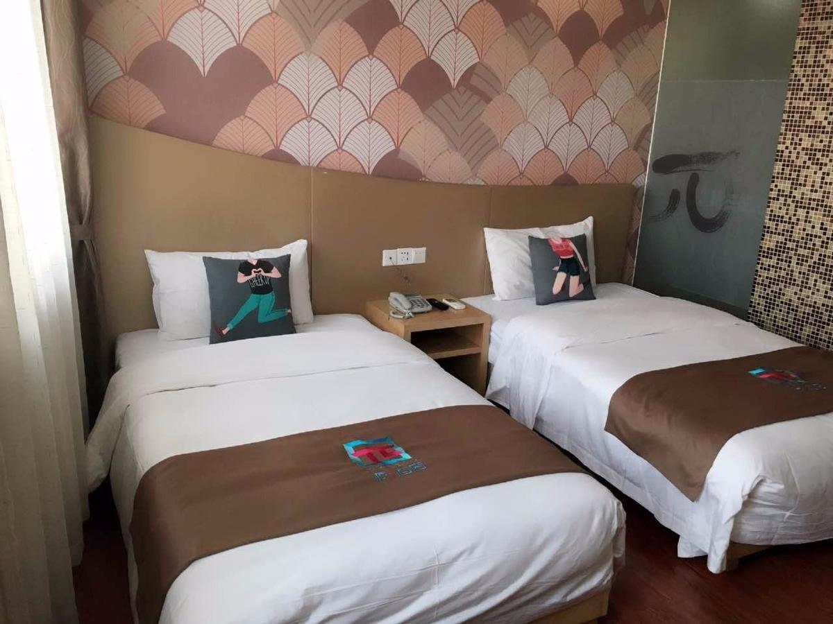 Pai Hotel Heze Dingtao Wantai City Esterno foto