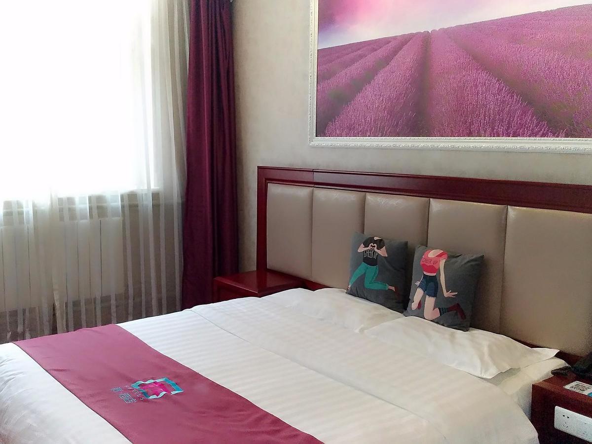 Pai Hotel Heze Dingtao Wantai City Esterno foto